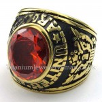 Gold Titanium Ring with Red Zircon